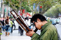 A street musician on Nanjing Rd, Shanghai