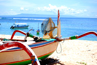 A Fishing Boat by the Beach