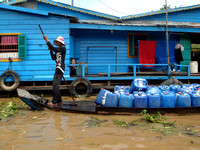 Selling Water on Water - Floating village at Tonle Sap